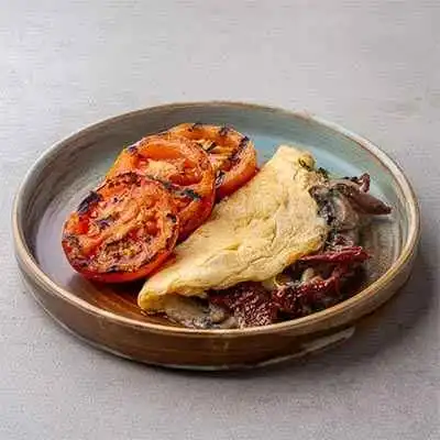 Sundried Tomato, Mozzarella and Basil Stuffed omelette  With Grilled Tomato